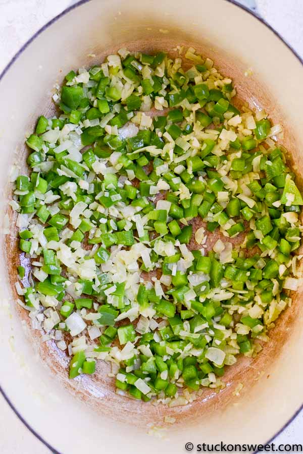 diced onion green pepper and garlic in a dutch oven 