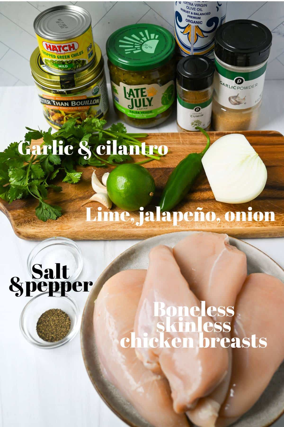 Ingredients for preparing green chili chicken arranged on a kitchen counter